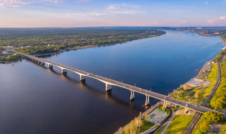 Aerial top view panorama city Perm and central embankment of Kama river Russia, sunset drone photoの写真素材