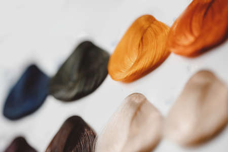 Set hair brunette tints colors palette on hairdresser backgroundの写真素材