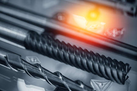 Set of drills and cutters for automatic metal processing machine, toning color sunlightの写真素材