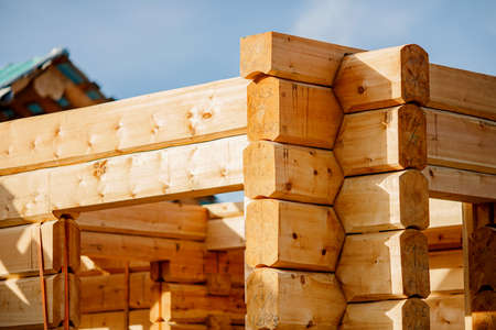 Building industrial corner of wooden construction frame logsの写真素材