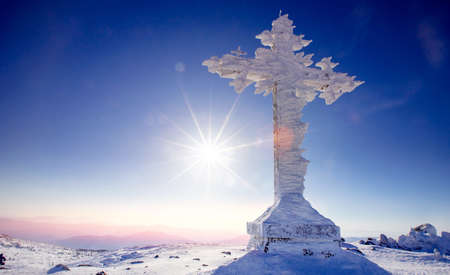 Cold landscape worship cross mountain Kemerovo region Russia in winter forestの写真素材