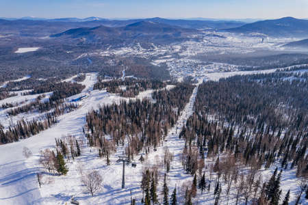 Aerial top view Sheregesh ski lift resort winter, landscape mountain and hotels, Russia Kemerovo regionの写真素材