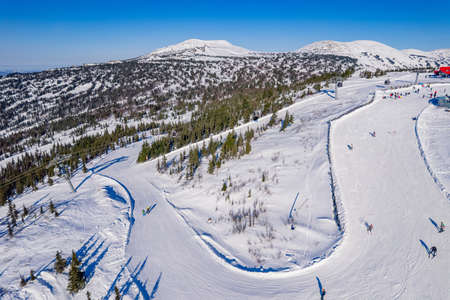 Sheregesh ski lift resort winter, landscape mountain and hotels, aerial top view Russia Kemerovo regionの写真素材