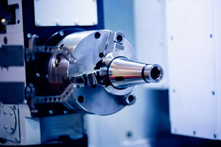 Working metal body is cutter of drilling CNC machine in automatic productionの写真素材