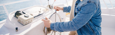 Concept banner rental or training driver captain of white luxury yacht holding helm wheelの写真素材