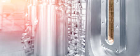 Banner Brewery factory industry, Equipment dairy plant. Stainless steel storage bunker and processing tanksの写真素材