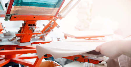Concept printing technology art design clothes. Heat thermal textile application transfer press color for tshirtの写真素材