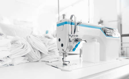 Banner industry tailor sewing machine on table workshop of white backgroundの写真素材