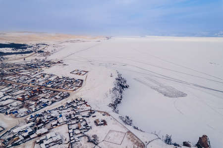 Khuzhir village Olkhon island winter ice of Lake Baikal, aerial top viewの写真素材