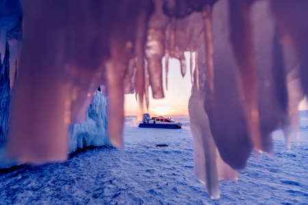 Hovercraft rides on clear ice of Lake Baikal winterの写真素材