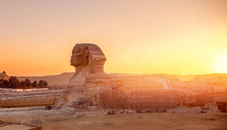 Wonder of world Sphinx and pyramids Giza, Egypt sunset skyの写真素材