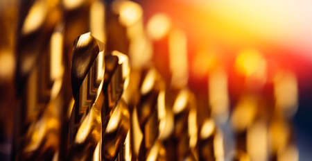 Closeup drill bit set for CNC machine cutting sheet metal, Industrial bannerの写真素材