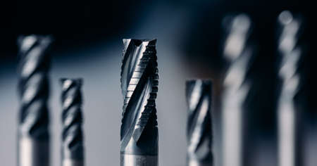 Closeup drill bit set for CNC machine cutting sheet metal, Industrial bannerの写真素材