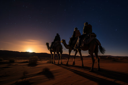 Three figures on camels following a bright star in a night desert sceneの素材