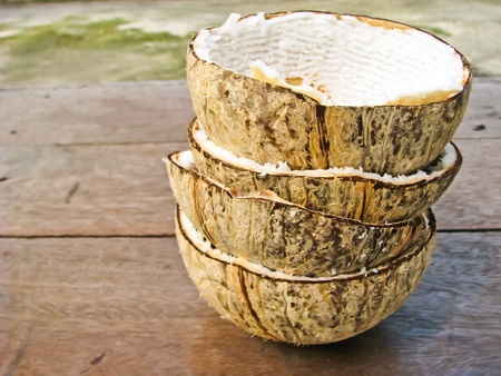 coconut shells on table の写真素材