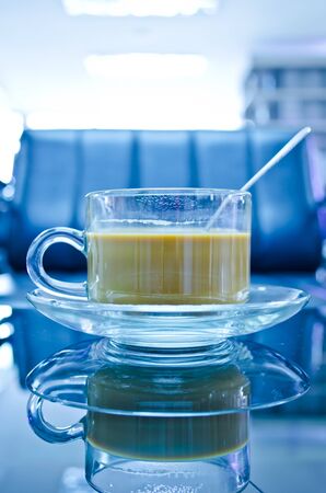 hot coffee in glass cup with plateの写真素材