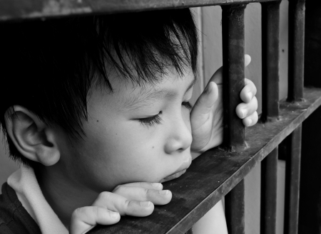 Young Child Looking Sad の写真素材