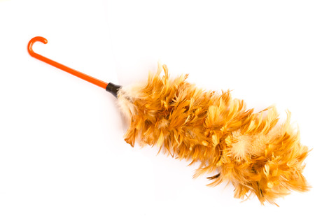Feather broom for cleaning isolated on white background の写真素材