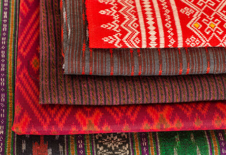  Stack of Thai style fabric at shopの写真素材