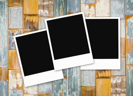 Photo frame on old wood texture background 