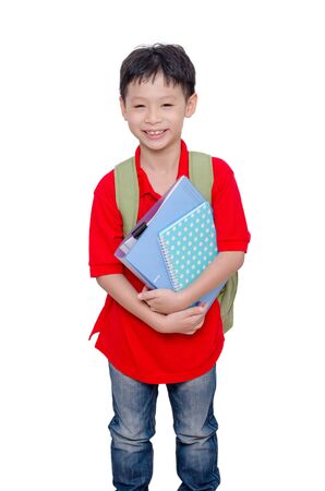 Young Asian schoolboy with backpack over whiteの写真素材