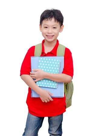 Young Asian schoolboy with backpack over whiteの写真素材
