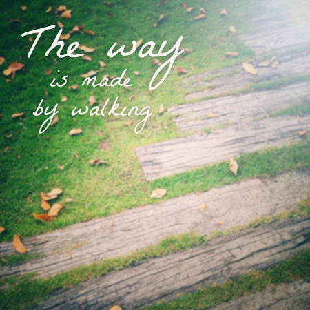 Inspirational quote : The way is made by walkingの写真素材