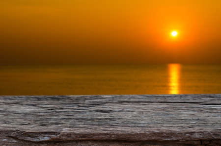 wood table top with blurred nature backgroundの写真素材