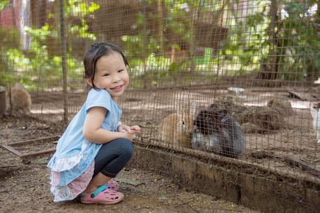 Little asian girl smiling in the zooの写真素材