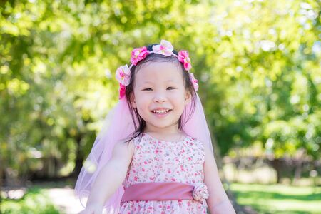 Little asian girl in parkの写真素材