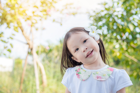 Girl smiling in parkの写真素材