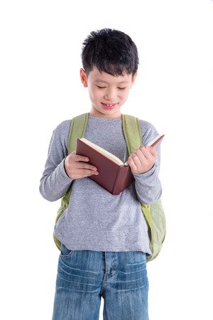 Boy reading bookの写真素材