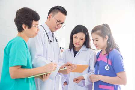 Asian Medical team,doctor meeting with nurse in hospitalの写真素材