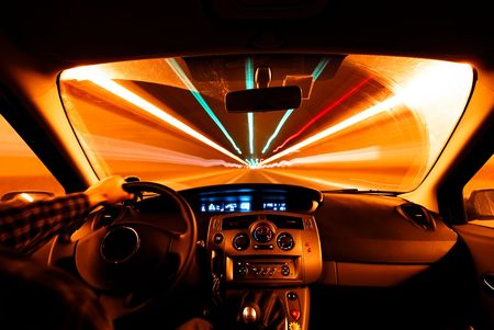 Night driving in a highway tunnelの写真素材