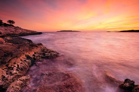 A dreamy postcard like sunset in mediterranean seaの写真素材