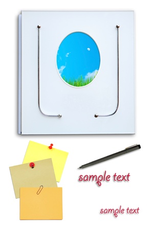 honeymoon photo album with yellow memo and penの写真素材