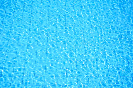 blue swimming pool with ripple water の写真素材