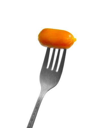 Sausage on old forkの写真素材