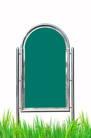blank sign on green grassの写真素材