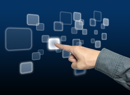hand pushing a button on a touch screen interface の写真素材