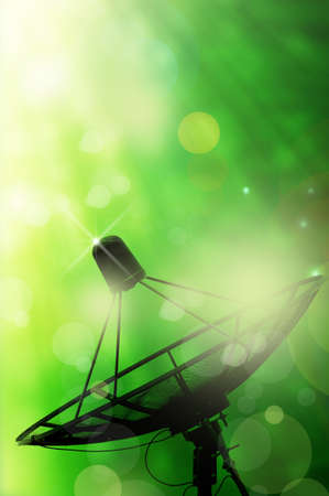 satellite dish antennas and abstract spring green background with light reflectの写真素材
