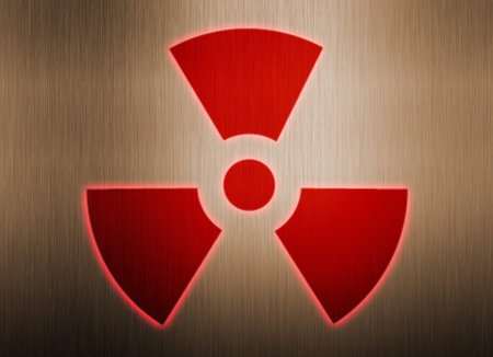 radioactive symbol on metal background
