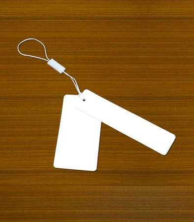 white label on old wood backgroundの写真素材