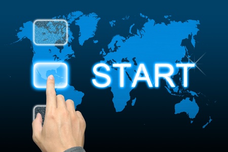 businessman hand pressing start button on a touch screen interface の写真素材