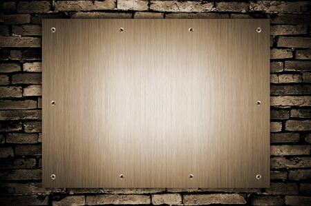 metal plate and screw on grunge wallの写真素材