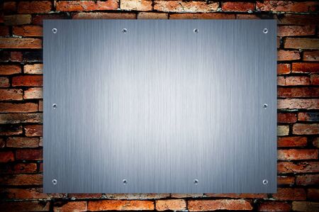 metal plate and screw on grunge wallの写真素材