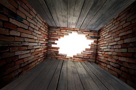 hole on wall in empty roomの写真素材