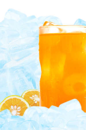 orange juice in glass and ice isolated on white backgroundの写真素材