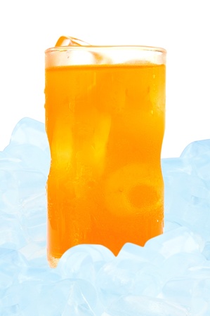 orange juice in glass and ice isolated on white backgroundの写真素材