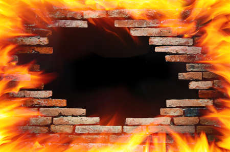 hole wall and fireの写真素材